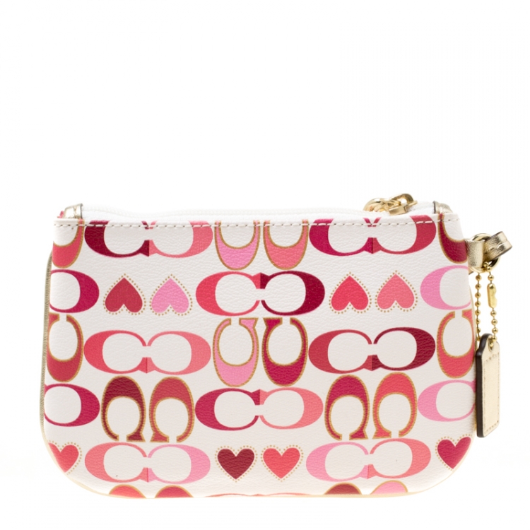 Pre Owned Coach White/Pink Heart Printed Coated Canvas Poppy Wristlet Clutch