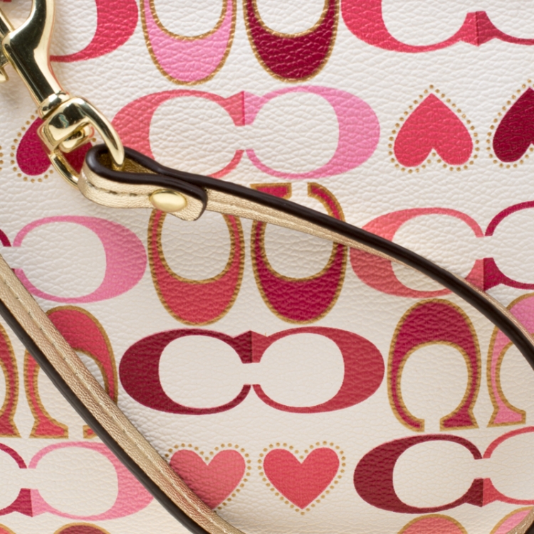 Pre Owned Coach White/Pink Heart Printed Coated Canvas Poppy Wristlet Clutch