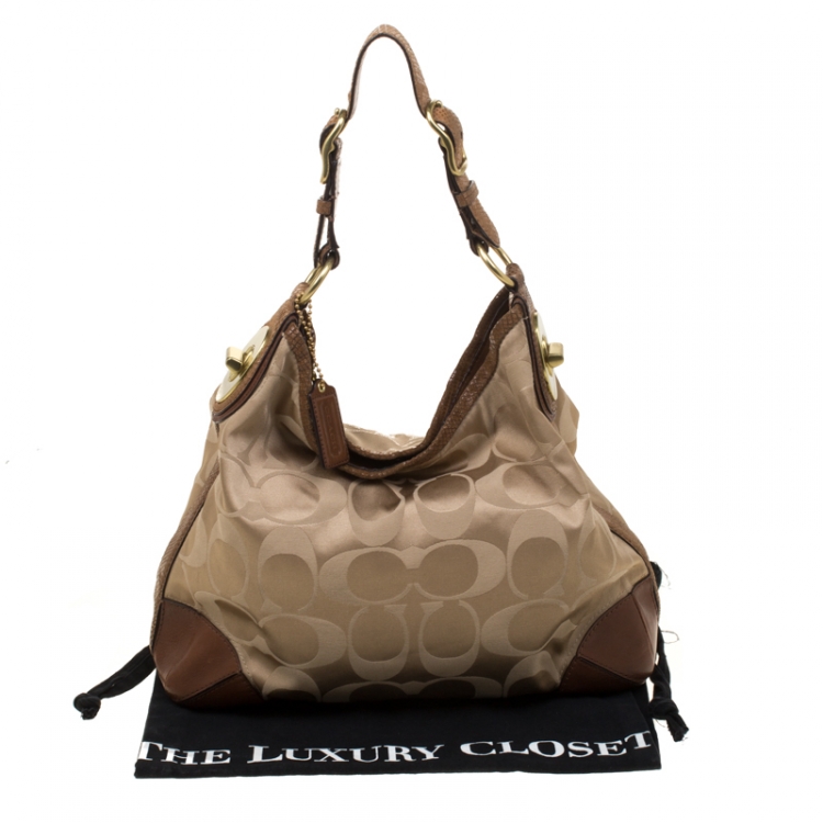 Pre Owned Coach Beige/Brown Signature Canvas and Leather Hobo
