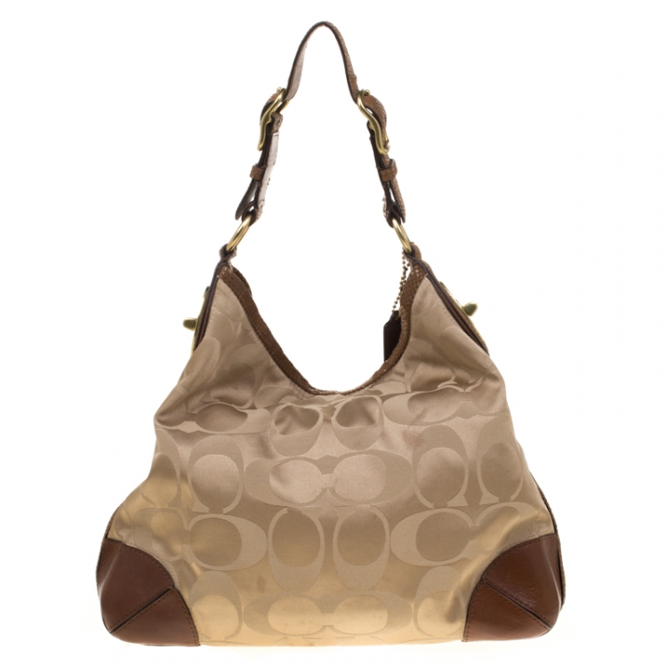 Pre Owned Coach Beige/Brown Signature Canvas and Leather Hobo