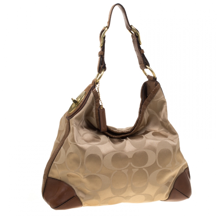 Pre Owned Coach Beige/Brown Signature Canvas and Leather Hobo