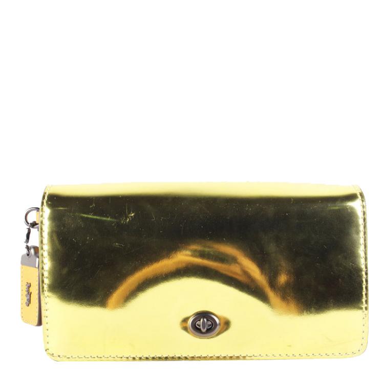 gold patent clutch bag