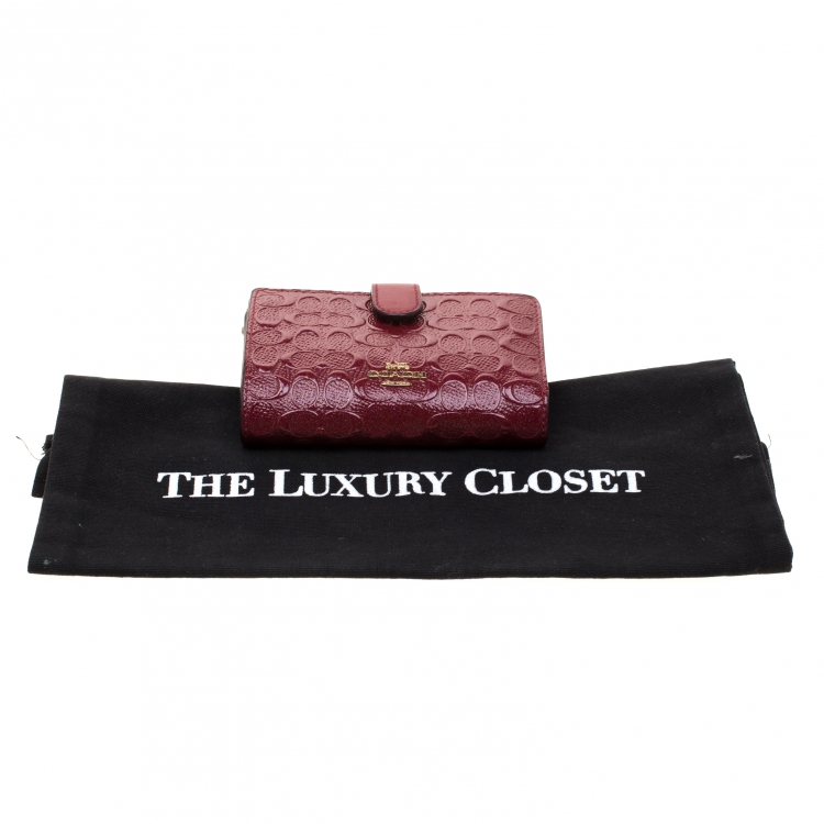 Pre Owned Coach Burgundy Signature Debossed Patent Leather Wallet