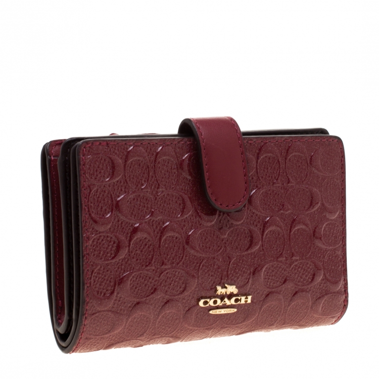 Pre Owned Coach Burgundy Signature Debossed Patent Leather Wallet