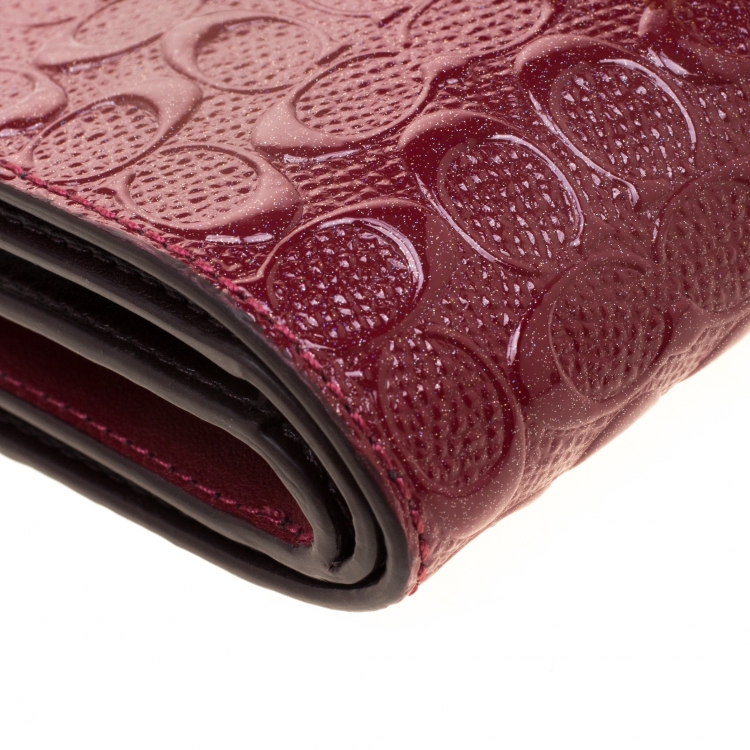 Pre Owned Coach Burgundy Signature Debossed Patent Leather Wallet