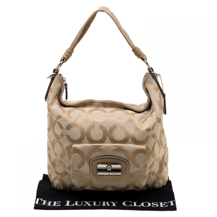 Pre Owned Coach Cream Canvas Kristin Hobo