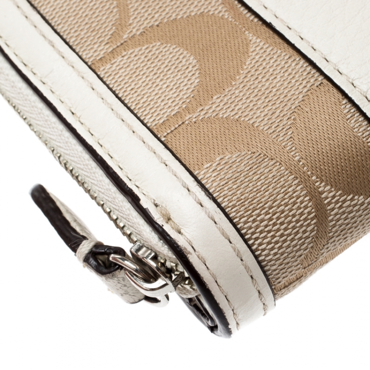 Pre Owned Coach Beige/White Signature Canvas and Leather Compact Wallet