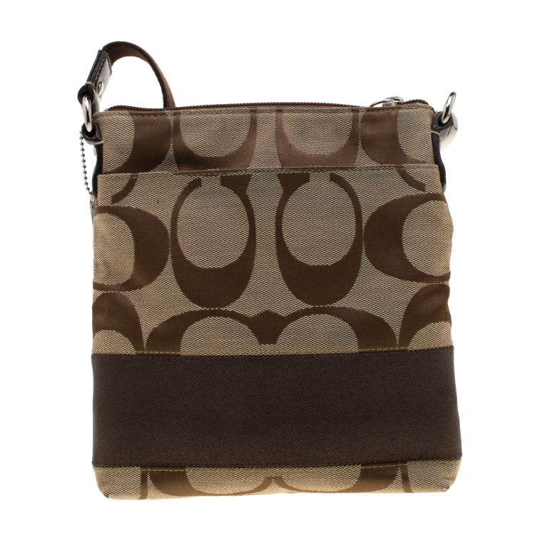 Pre Owned Coach Brown/Beige Signature Canvas Swingpack Crossbody Bag