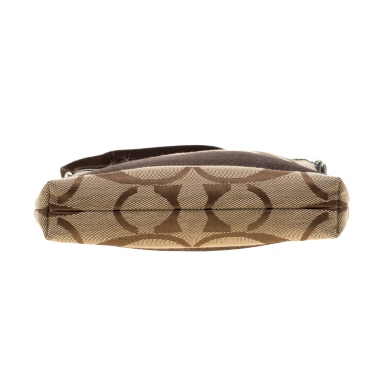 Pre Owned Coach Brown/Beige Signature Canvas Swingpack Crossbody Bag