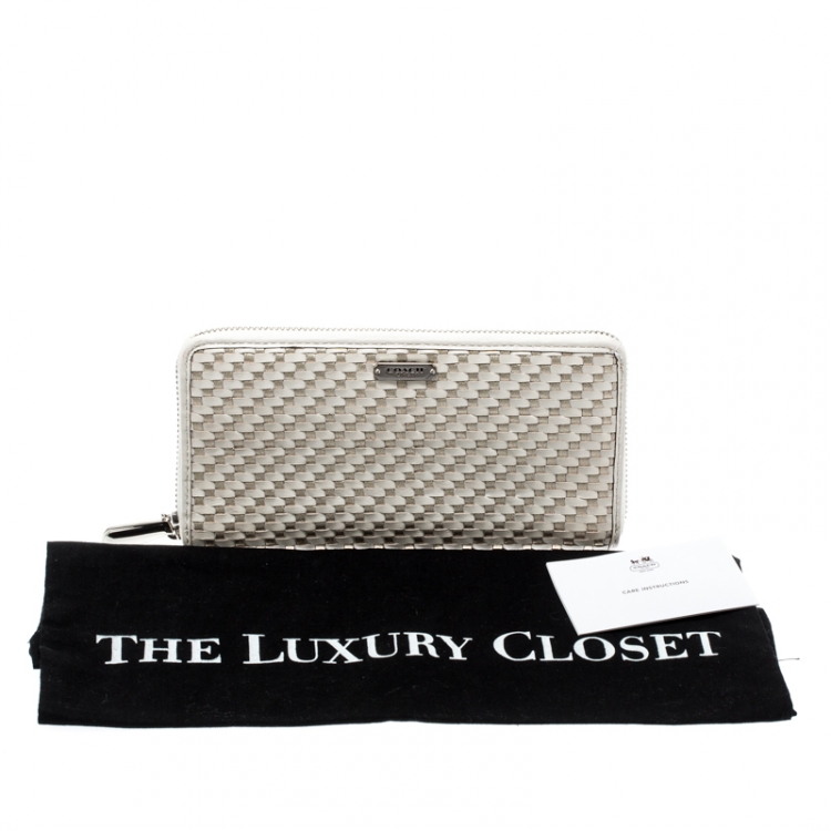 Pre Owned Coach Off White/Silver Woven Leather Zip Around Wallet 