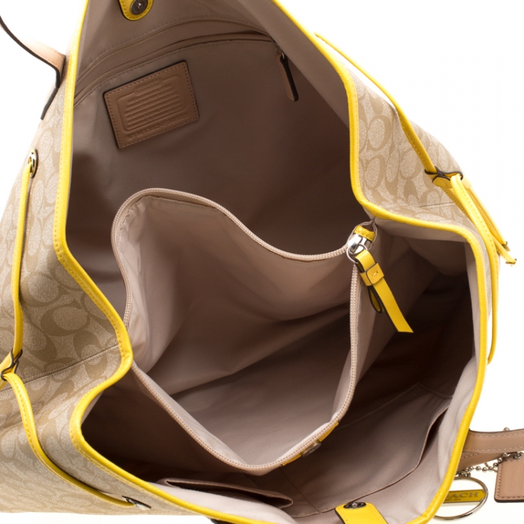 Pre Owned Coach Beige/Yellow Coated Canvas and Leather Large Stripe Drawstring Signature Tote