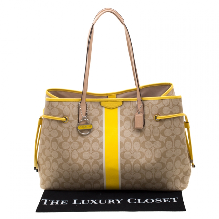 Pre Owned Coach Beige/Yellow Coated Canvas and Leather Large Stripe Drawstring Signature Tote