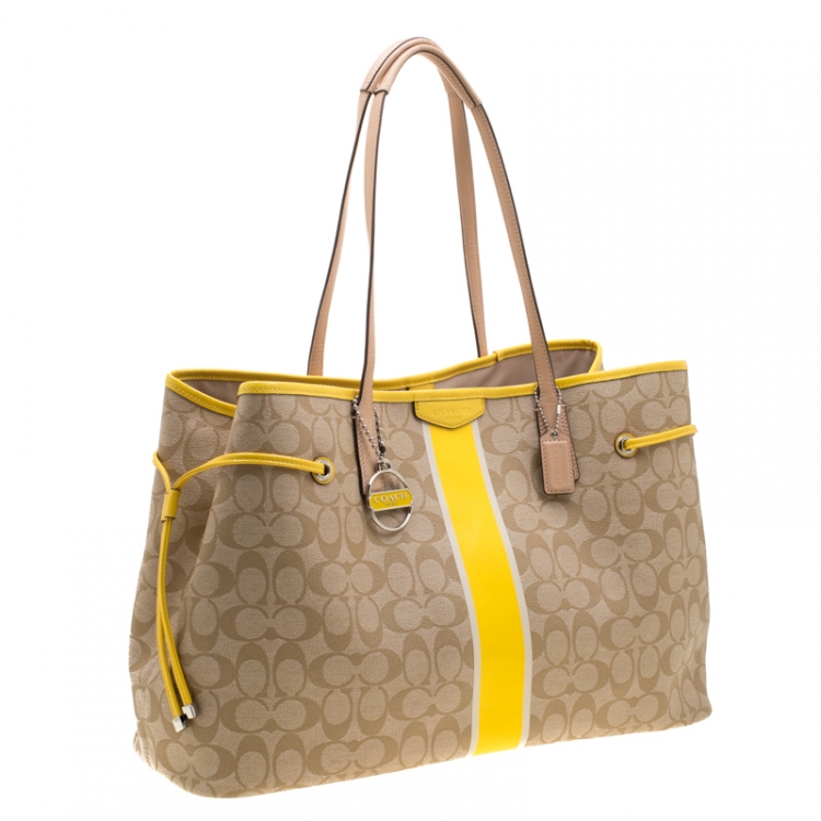 Pre Owned Coach Beige/Yellow Coated Canvas and Leather Large Stripe Drawstring Signature Tote