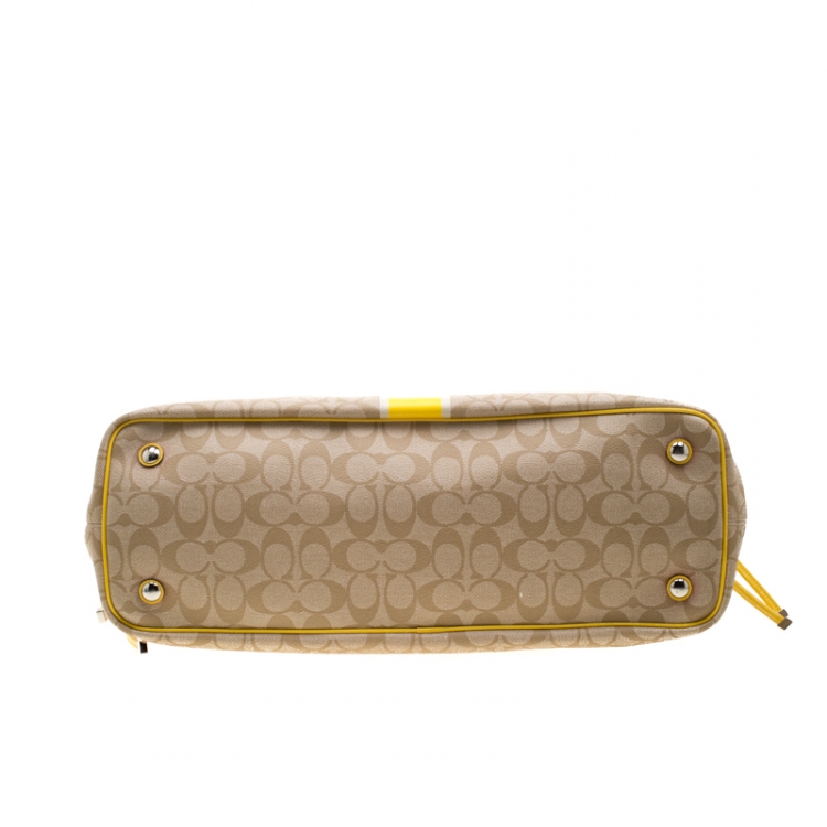 Pre Owned Coach Beige/Yellow Coated Canvas and Leather Large Stripe Drawstring Signature Tote