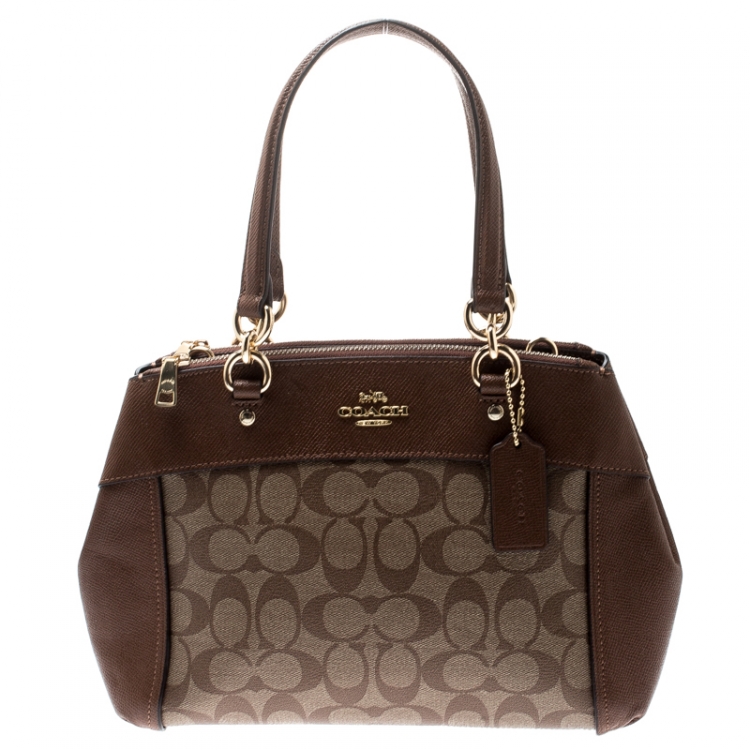 Pre Owned Coach Brown Signature Coated Canvas and Leather Brooke Caryall Satchel