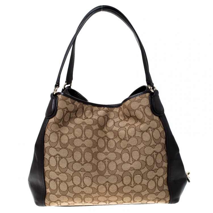 Pre Owned Coach Beige/Brown Signature Canvas and Leather Edie 31 Satchel