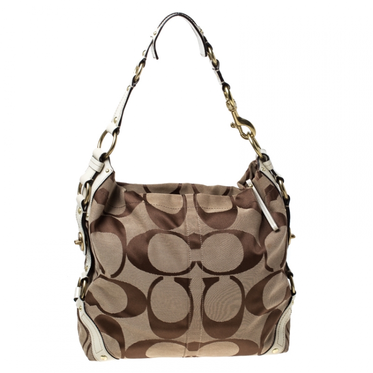 Pre Owned Coach Beige Signature Canvas and Leather Carly Hobo