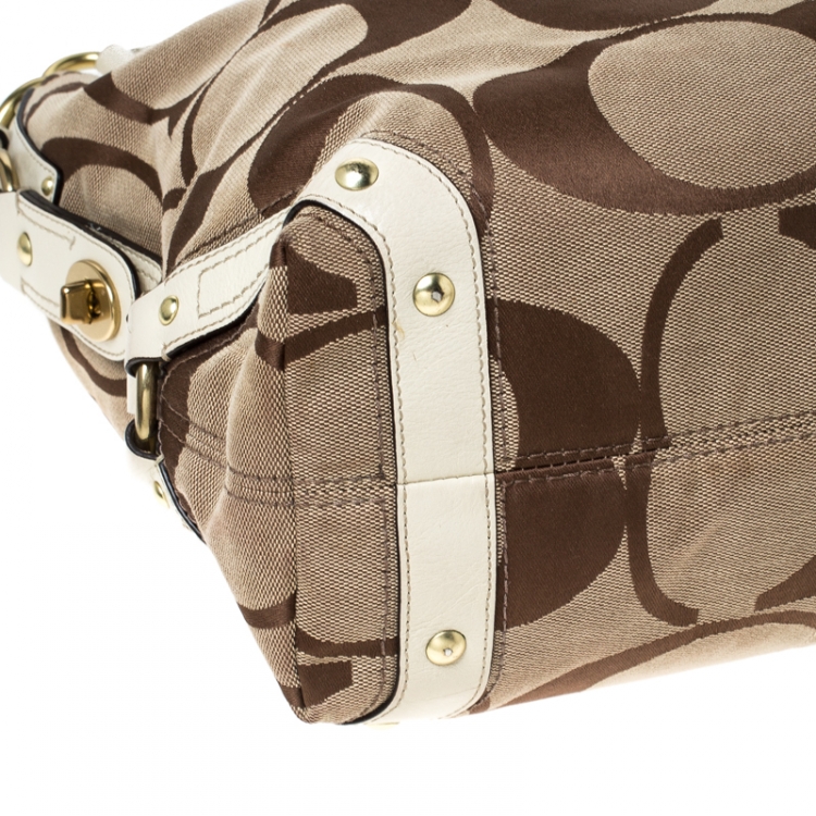 Pre Owned Coach Beige Signature Canvas and Leather Carly Hobo