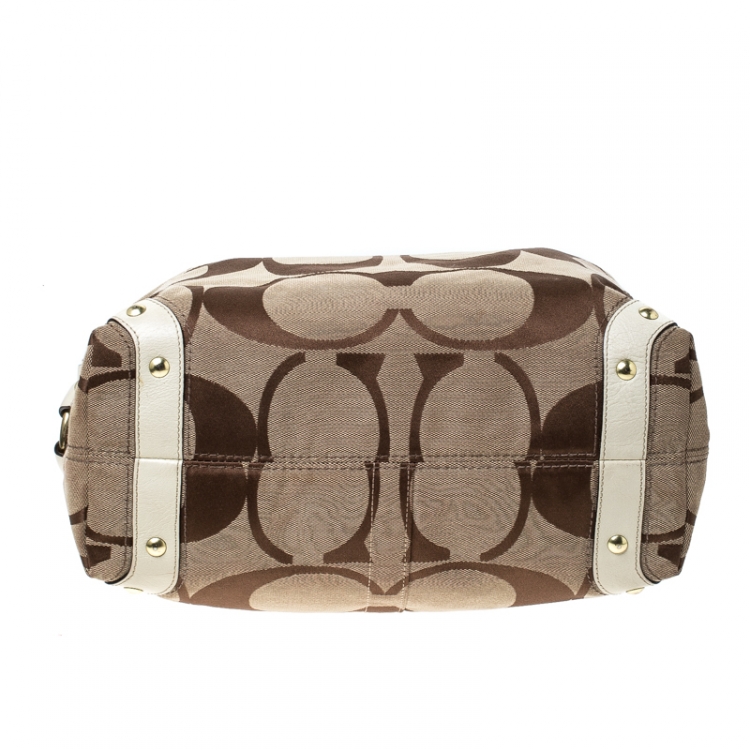 Pre Owned Coach Beige Signature Canvas and Leather Carly Hobo