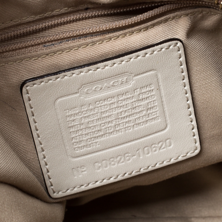 Pre Owned Coach Beige Signature Canvas and Leather Carly Hobo
