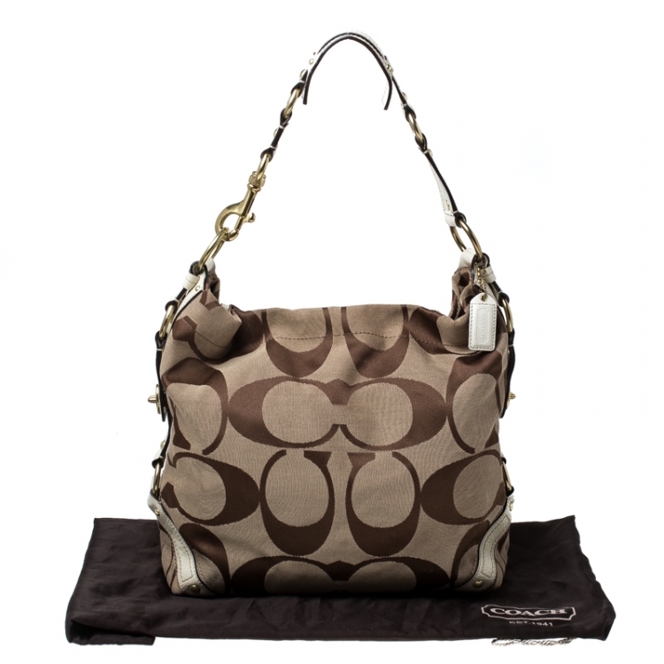 Pre Owned Coach Beige Signature Canvas and Leather Carly Hobo