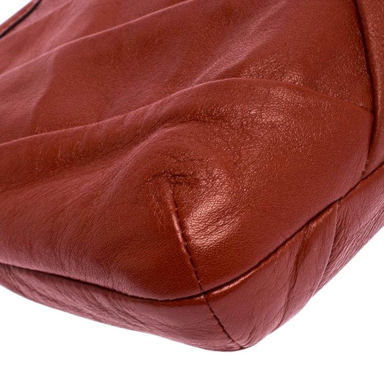 Pre Owned Coach Dark Orange Pleated Leather Pochette