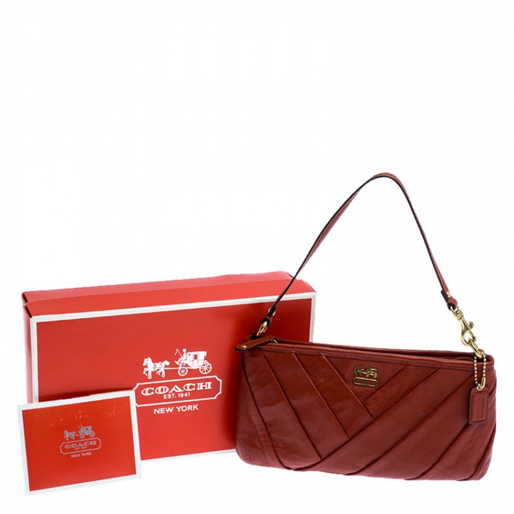 Pre Owned Coach Dark Orange Pleated Leather Pochette