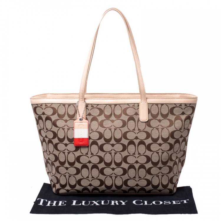 Pre Owned Coach Beige/Brown Signature Canvas and Leather Shopper Tote