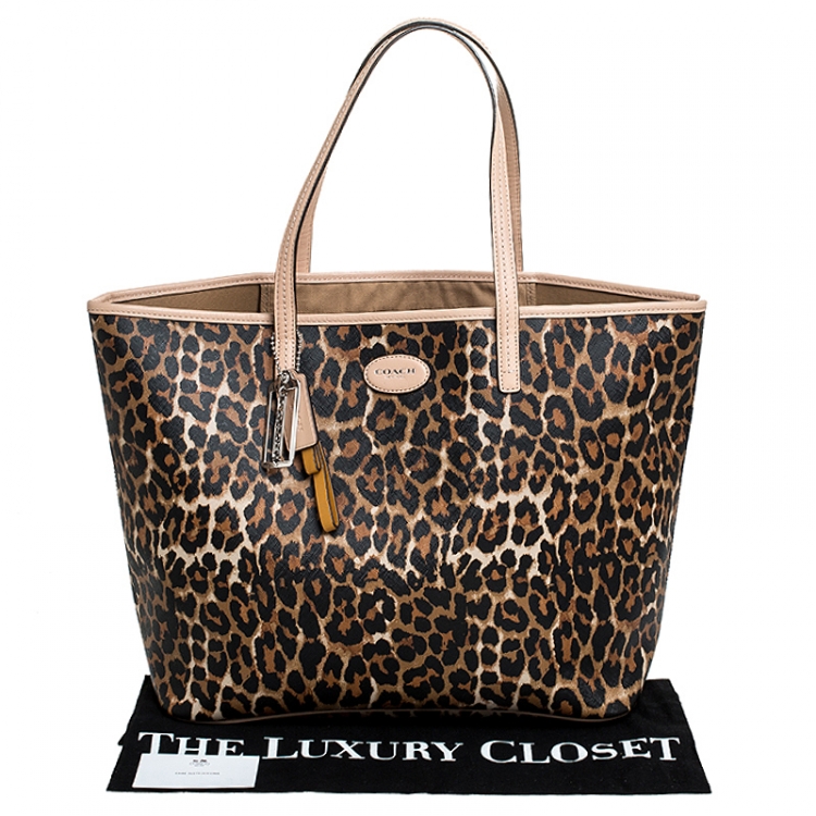Pre Owned Coach Brown Leopard Print Coated Canvas City Zip Tote