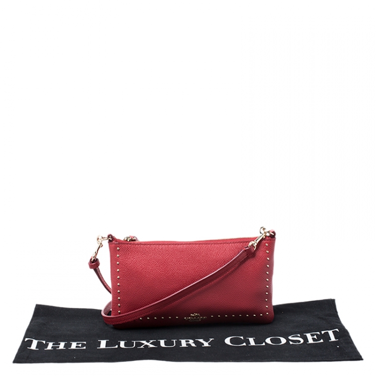 Pre Owned Coach Red Leather Herald Stud Crossbody Bag