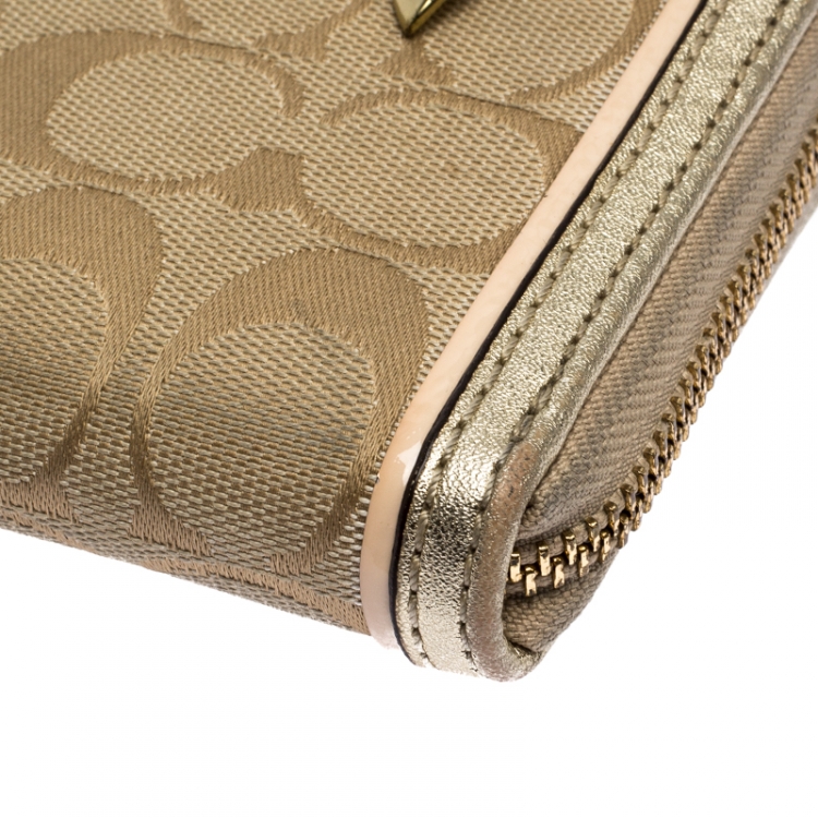 Pre Owned Coach Metallic Gold Signature Canvas Zip Around Wallet