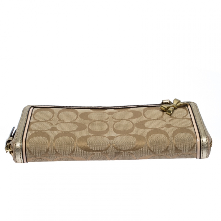 Pre Owned Coach Metallic Gold Signature Canvas Zip Around Wallet