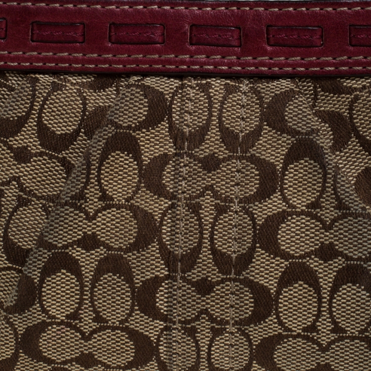 Pre Owned Coach Brown/Burgundy Monogram Canvas Wristlet Pouch