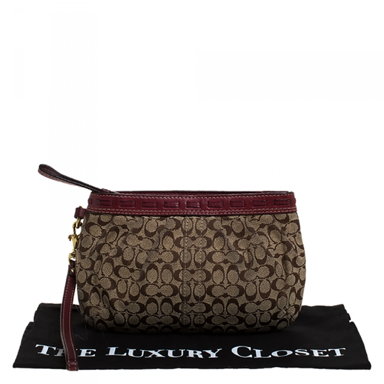 Pre Owned Coach Brown/Burgundy Monogram Canvas Wristlet Pouch