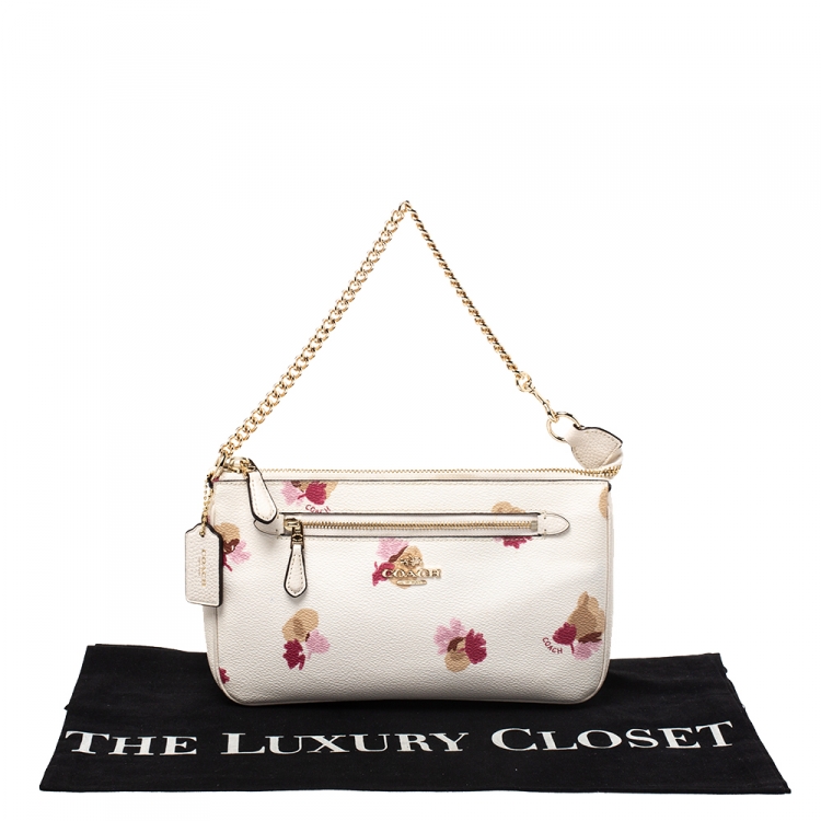 Pre Owned Coach White Floral Print Coated Canvas Pochette Bag