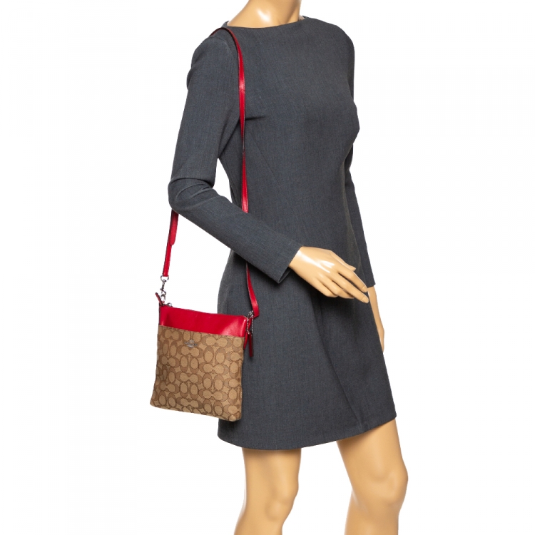 مملوكة مسبقًا  Coach Brown/Red Signature Canvas and Leather Courie Crossbody Bag