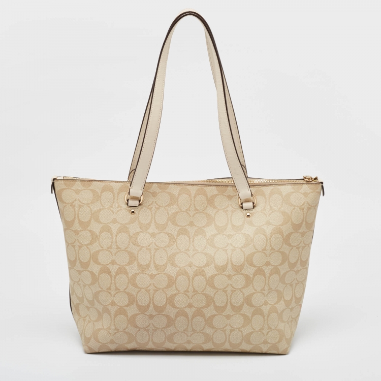 Pre Owned Coach Beige/White Signature Coated Canvas and Leather Gallery Tote