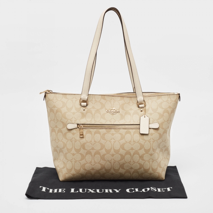Pre Owned Coach Beige/White Signature Coated Canvas and Leather Gallery Tote
