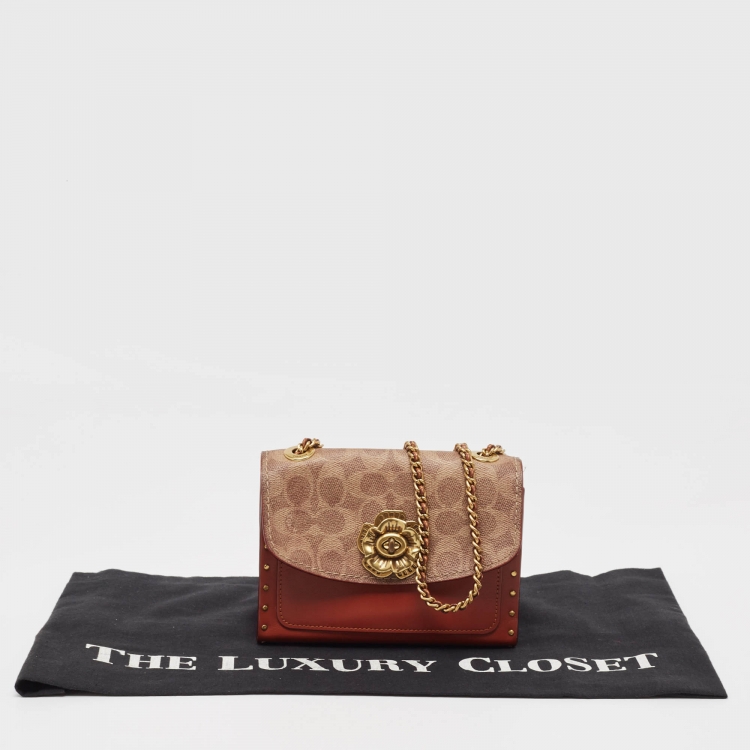 Pre Owned Coach Brown/Beige Signature Coated Canvas and Leather Parker Crossbody Bag