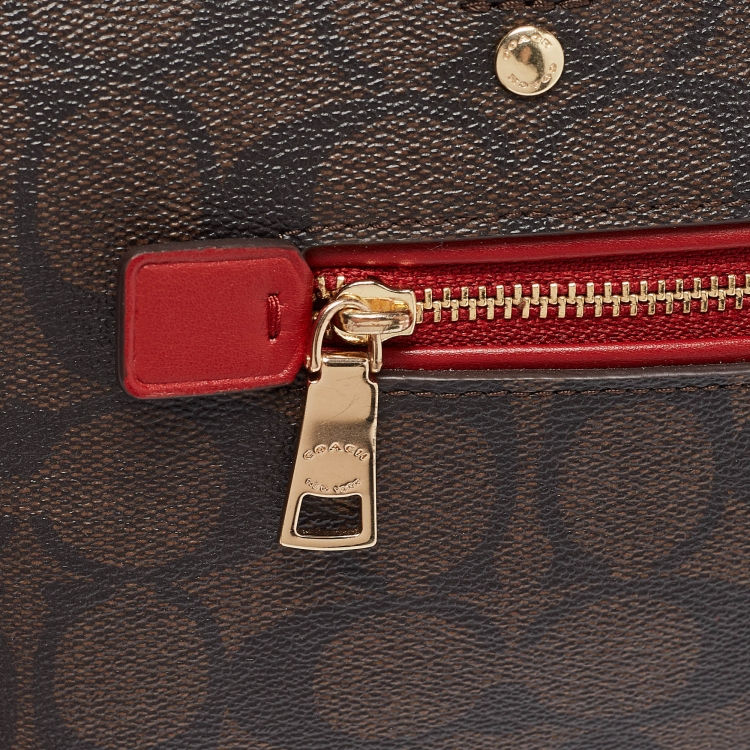 Pre Owned Coach Red/Brown Signature Coated Canvas and Leather Rowan Boston Bag