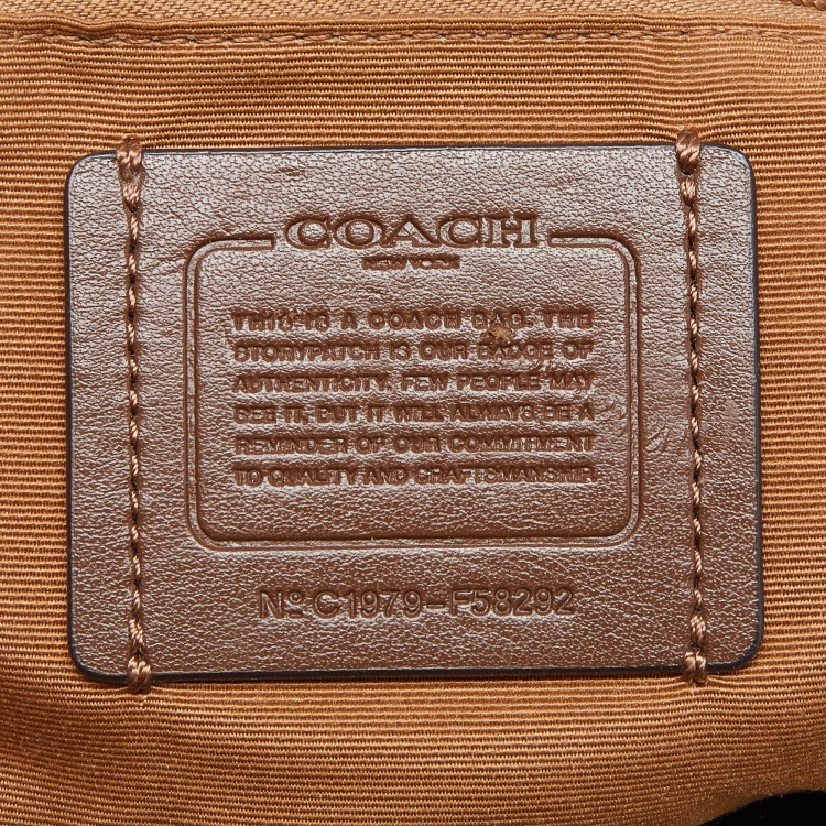 Pre Owned Coach Beige/Brown Signature Coated Canvas and Leather City Zip Tote