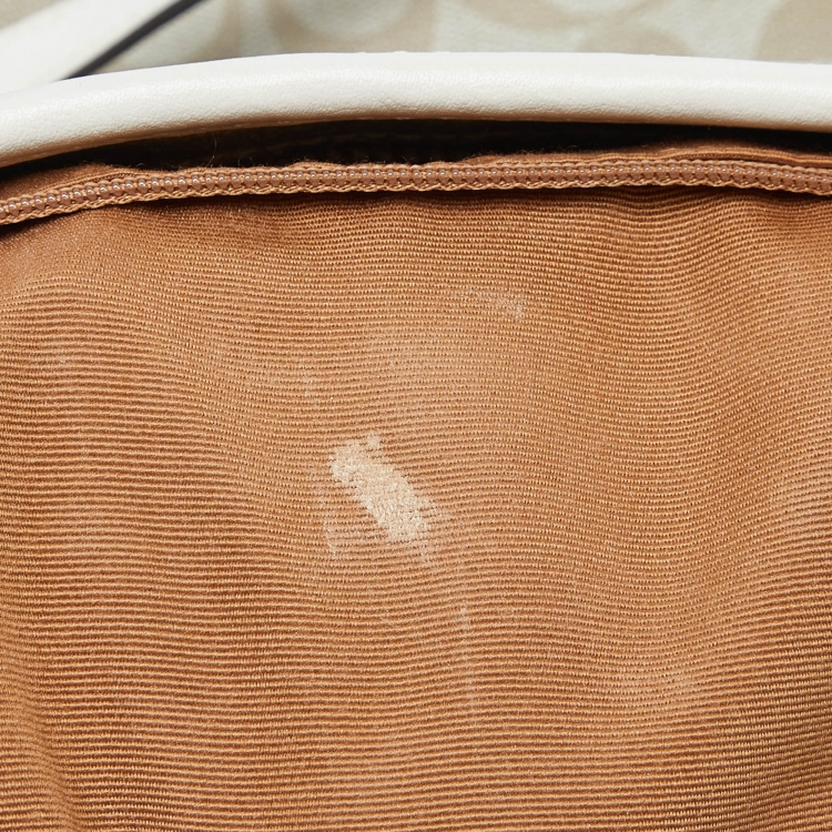 Pre Owned Coach Beige/Brown Signature Coated Canvas and Leather City Zip Tote