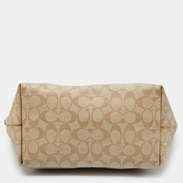 Pre Owned Coach Beige/Brown Signature Coated Canvas and Leather City Zip Tote