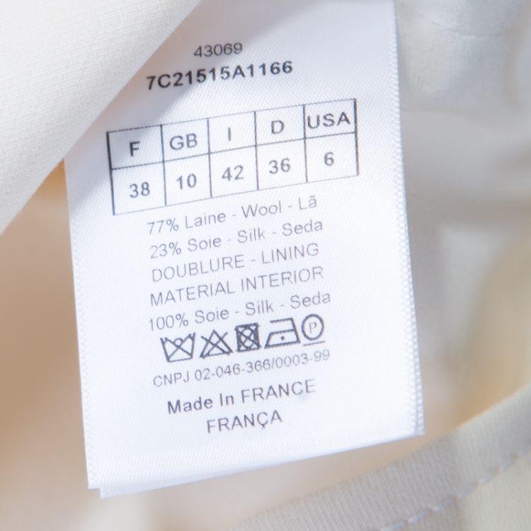 Pre Owned Dior Cream Wool and Silk Crescent Pocket Detail Faux Wrap Sleeveless Tunic M