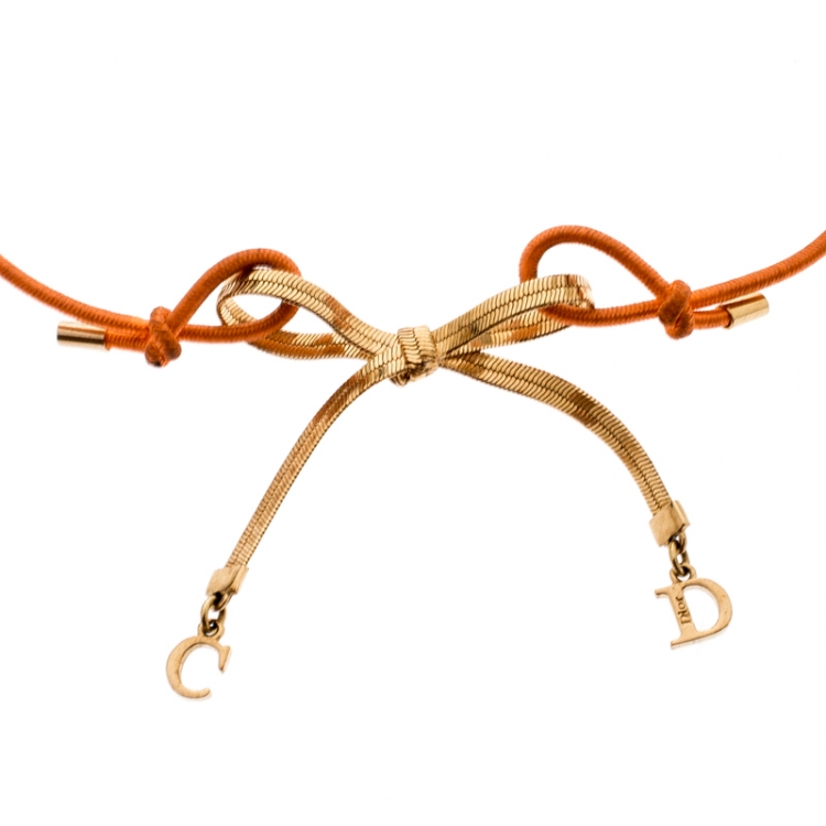 Pre Owned Dior Orange Cord CD Charm Gold Tone Bow Choker Necklace