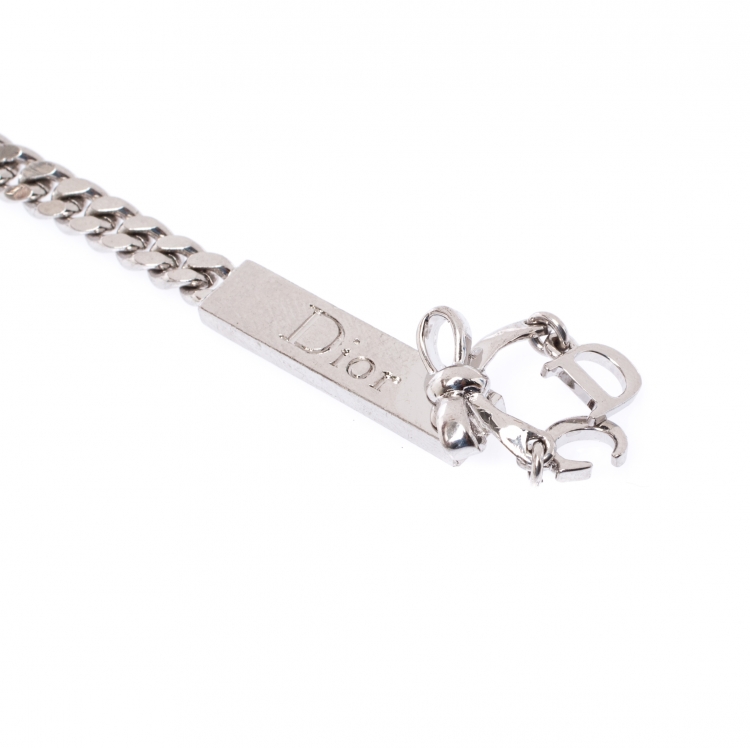 Pre Owned Dior Bow Chain Tag Silver Tone Clip-on Dangle Earrings