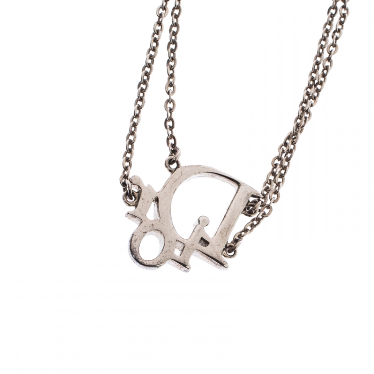 Pre Owned Dior Crystal Embellished Logo Silver Tone Bracelet