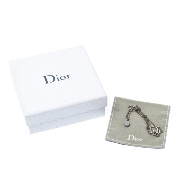 Pre Owned Dior Crystal Embellished Logo Silver Tone Bracelet