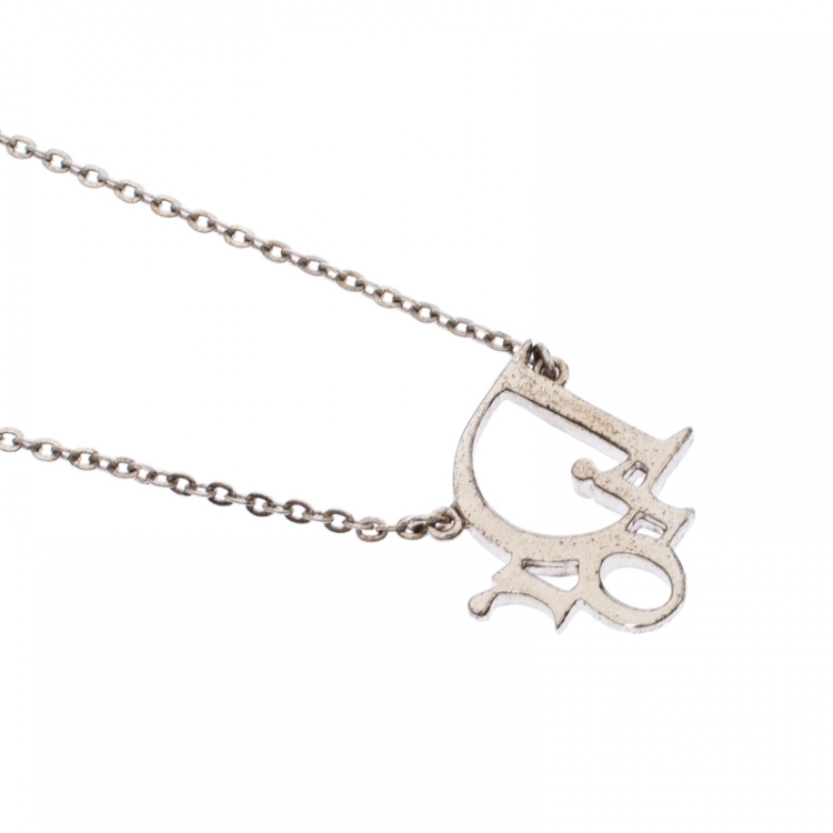 Pre Owned Dior Silver Tone Crystal Accented Logo Pendant Necklace