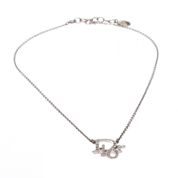 Pre Owned Dior Silver Tone Crystal Accented Logo Pendant Necklace